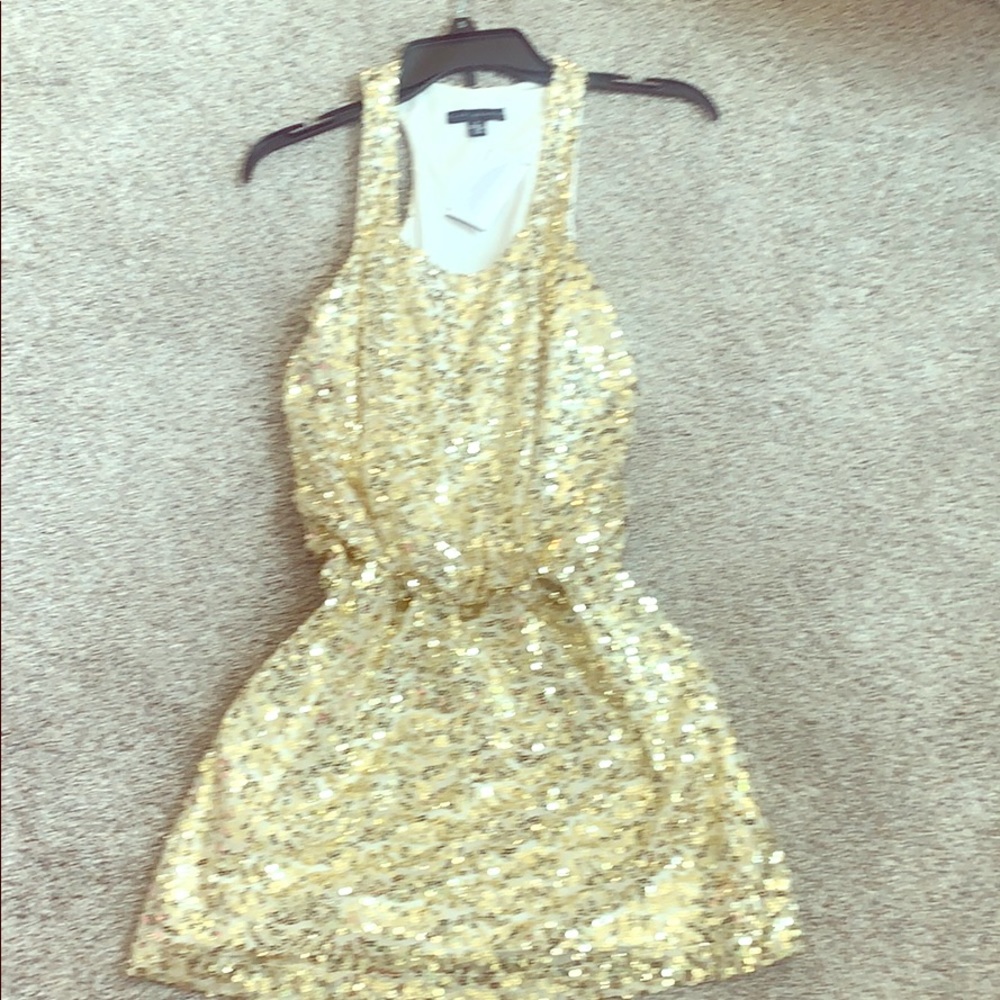 Women’s gold sequin racerback dress